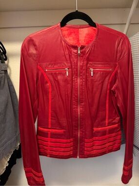 Beautiful red soft leather jacket with detail. High quality.size small or medium